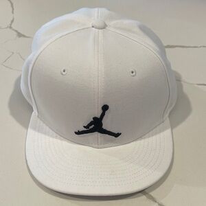 Jordan White Snapback Hat with Black Jumpman Emblem
